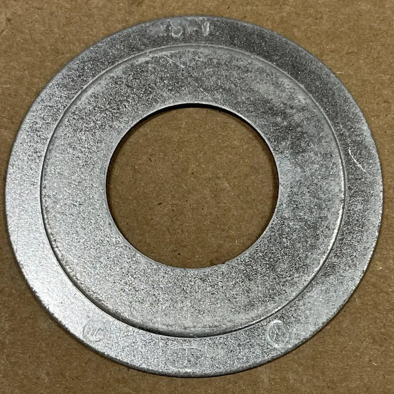 One Heavy Duty Reducing Washer Converting Two Inch Conduit To One Inch Hole With Slick Silver Finish For Easy Drop In Electrical Hook Ups And Serious Wire Jobs