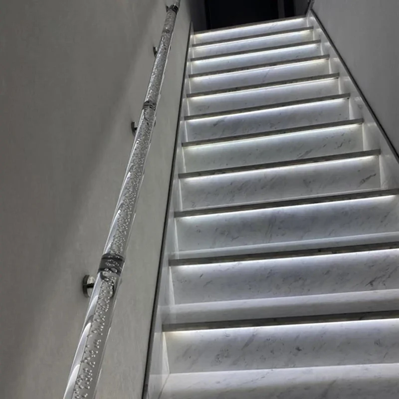 Sleek Transparent Acrylic Handrail With Heavy Duty Silver Wall Mount Brackets For Indoors Outdoors Stair And Deck Safety Featuring Bubble Design Supporting Four Hundred Forty Pounds Built Like A Tank For Daily Grind